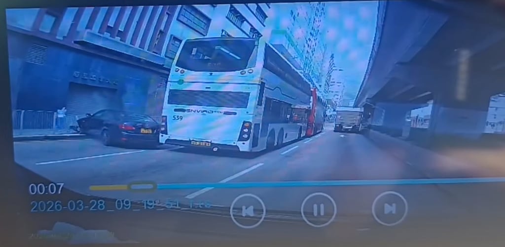 Dashcam footage online shows the car on Pui To Road hitting a bus that had stopped at the traffic light. Photo: Handout Dashcam footage online shows the car on Pui To Road hitting a bus that had stopped at the traffic light. Photo: Handout