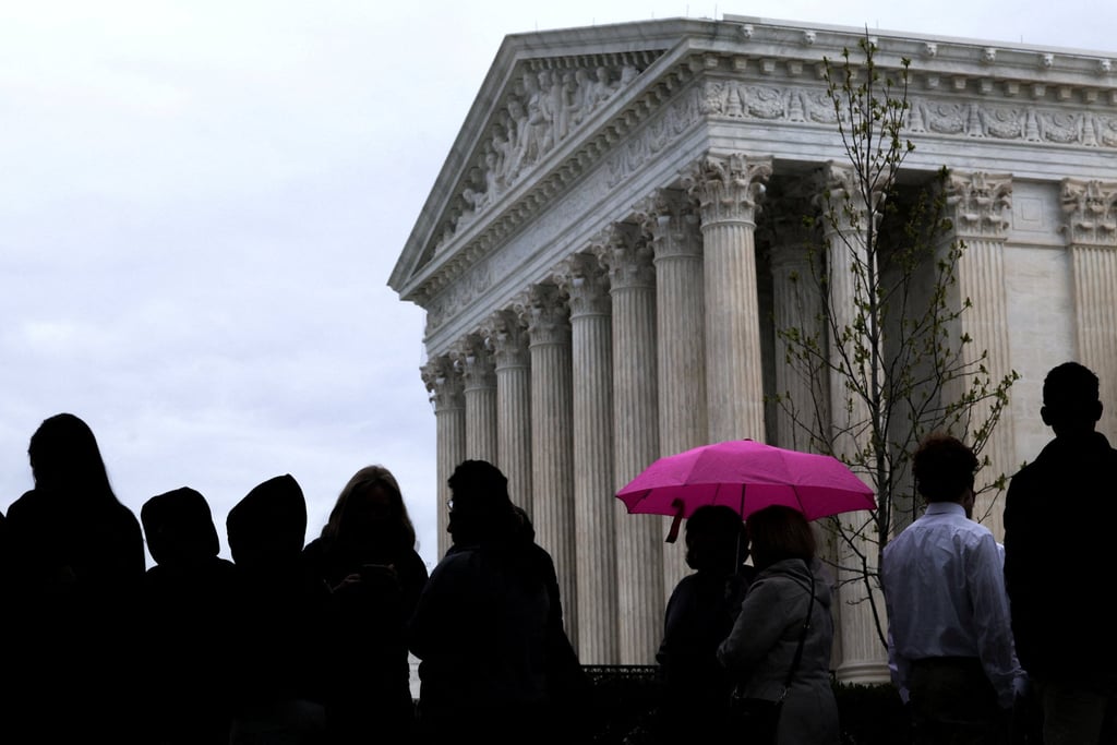 Visitors line up outside the US Supreme Court building to watch proceedings. Photo: Reuters Visitors line up outside the US Supreme Court building to watch proceedings. Photo: Reuters