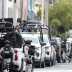 Arizona gun shop owner faces terrorism-related charges for allegedly selling high-caliber weapons bound for Mexican cartels