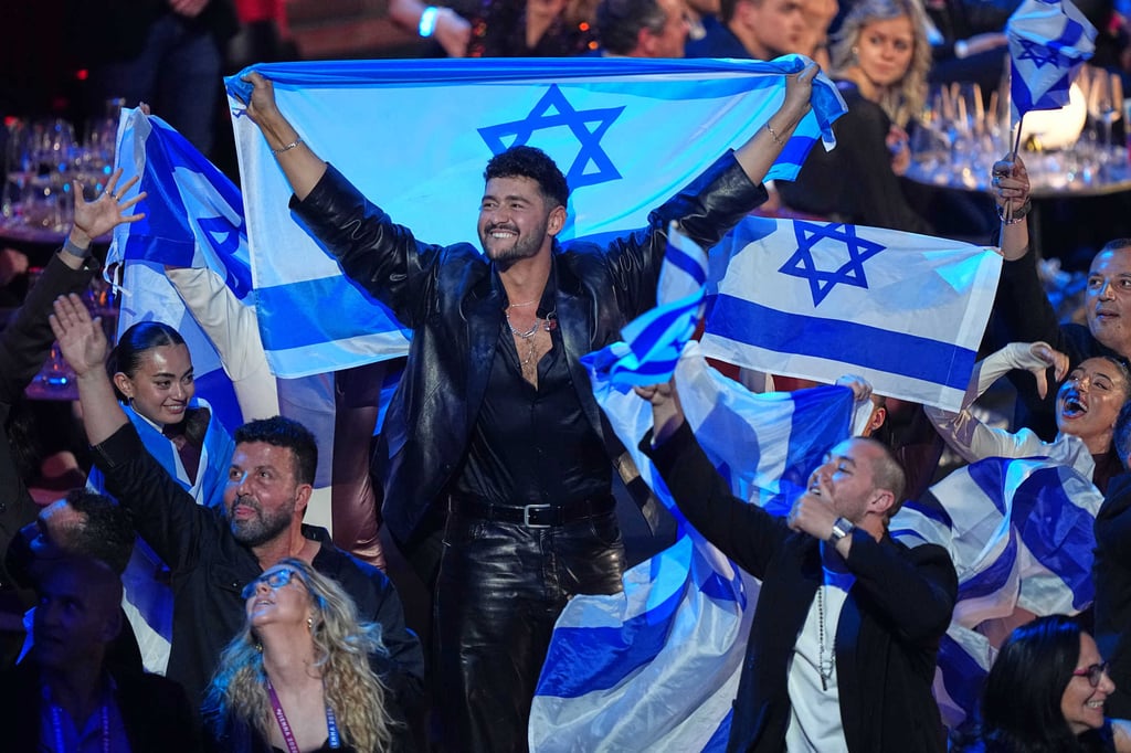 Noam Bettan from Israel (centre) reacts as the points are awarded during the grand final of the 70th Eurovision Song Contest in Vienna, Austria. Photo: AP Noam Bettan from Israel (centre) reacts as the points are awarded during the grand final of the 70th Eurovision Song Contest in Vienna, Austria. Photo: AP