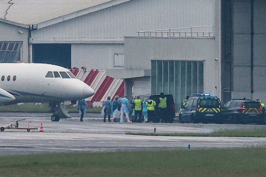Passengers evacuated from the cruise ship MV Hondius arrive at Le Bourget Airport, near Paris, on Sunday. Photo: Reuters Passengers evacuated from the cruise ship MV Hondius arrive at Le Bourget Airport, near Paris, on Sunday. Photo: Reuters