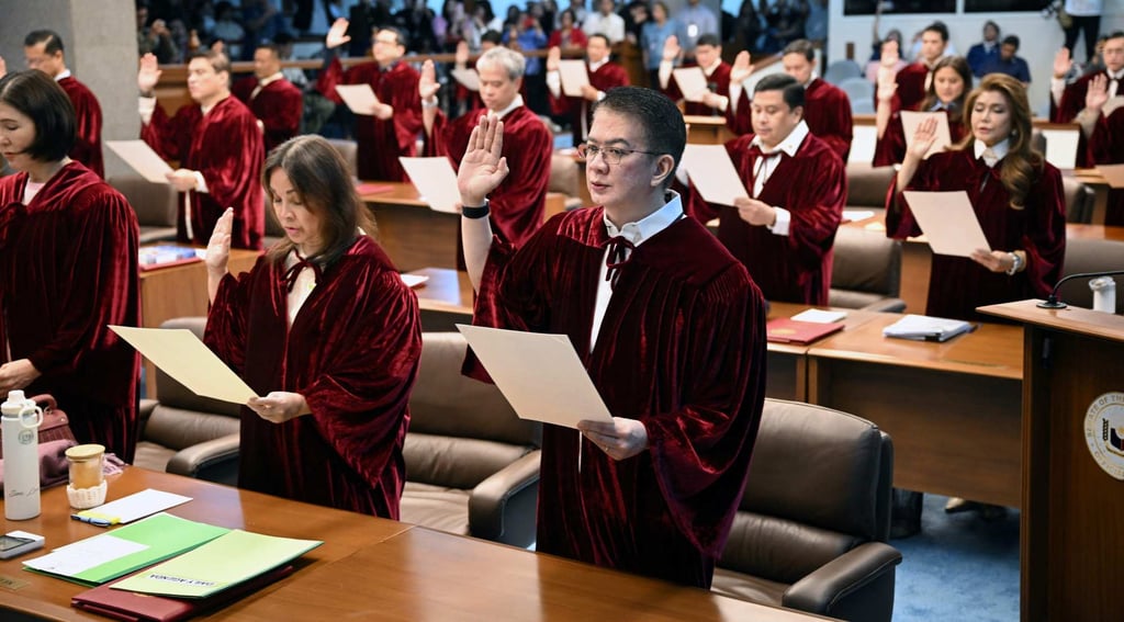 Philippine senators take their oath as jurors in the impeachment trial of Vice-President Sara Duterte at the plenary hall of the Senate in Manila on Monday. Photo: AFP Philippine senators take their oath as jurors in the impeachment trial of Vice-President Sara Duterte at the plenary hall of the Senate in Manila on Monday. Photo: AFP