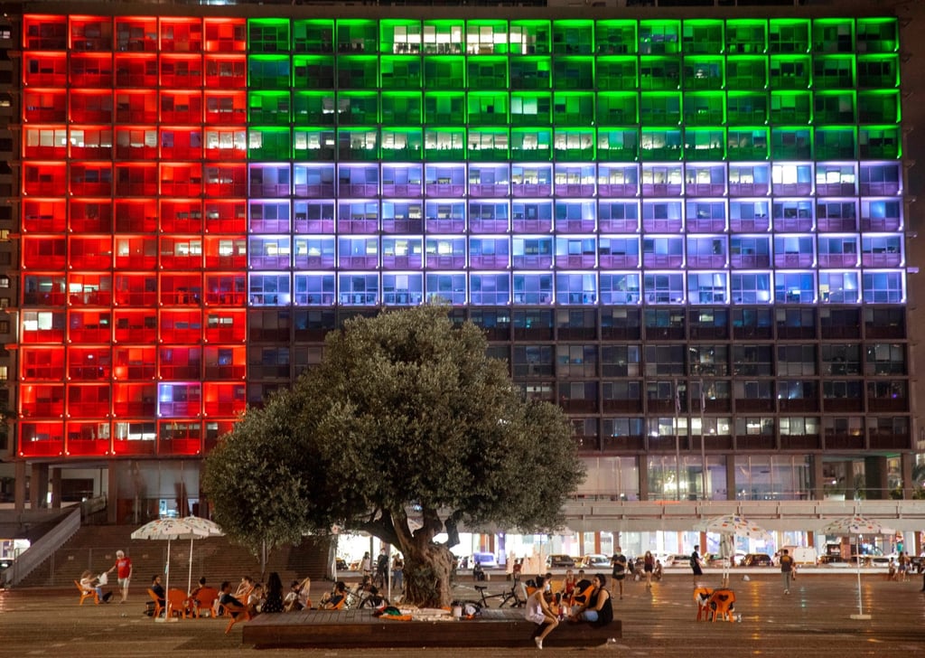 Tel Aviv City Hall is lit up with the UAE flag after the kingdom and Israel announced they would be establishing full diplomatic ties on August 13, 2020. Photo: AP Tel Aviv City Hall is lit up with the UAE flag after the kingdom and Israel announced they would be establishing full diplomatic ties on August 13, 2020. Photo: AP