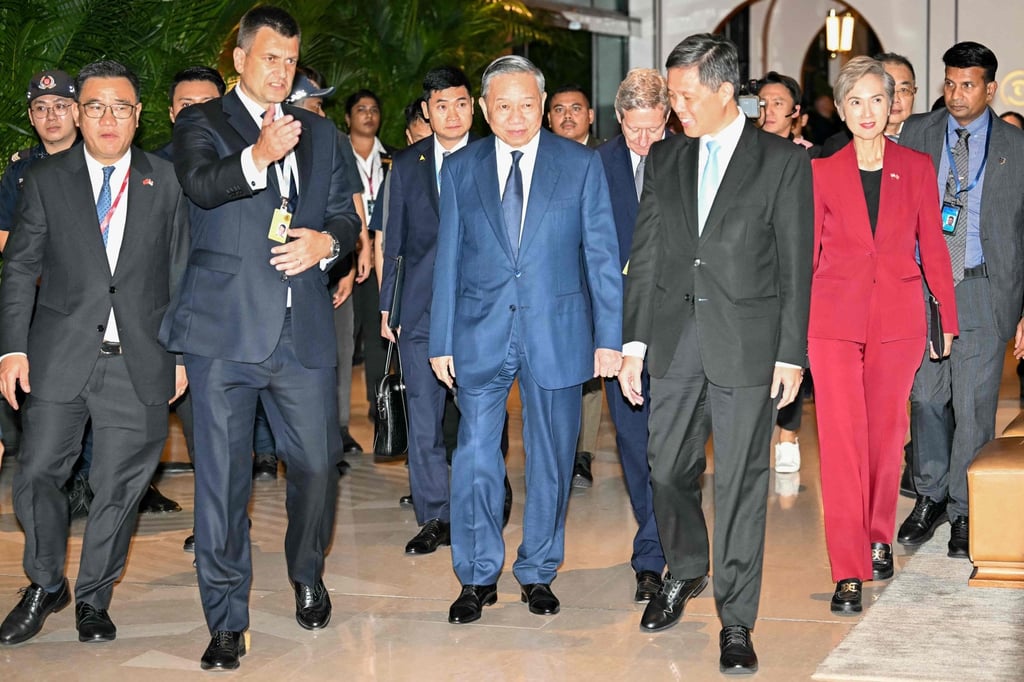 Vietnam’s President To Lam (centre) walks with Singapore’s Defence Minister Chan Chun Sing (centre right) during the 23rd Shangri-La Dialogue summit in Singapore on Friday. Photo: AFP Vietnam’s President To Lam (centre) walks with Singapore’s Defence Minister Chan Chun Sing (centre right) during the 23rd Shangri-La Dialogue summit in Singapore on Friday. Photo: AFP