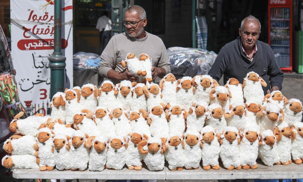 A vendor displays stuffed sheep toys outside his shop on the eve of the Eid al-Adha in the Israeli-occupied West Bank city of Nablus on Tuesday. Photo: AFP A vendor displays stuffed sheep toys outside his shop on the eve of the Eid al-Adha in the Israeli-occupied West Bank city of Nablus on Tuesday. Photo: AFP