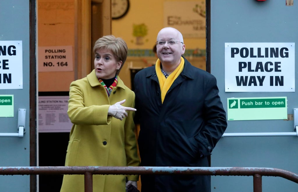 Nicola Sturgeon, then Scottish First Minister, poses for the media with husband Peter Murrell in Glasgow in 2019. Photo: AP Nicola Sturgeon, then Scottish First Minister, poses for the media with husband Peter Murrell in Glasgow in 2019. Photo: AP