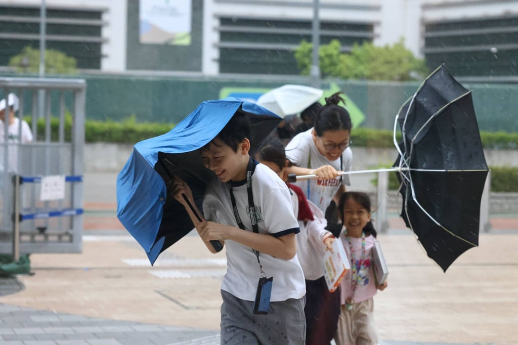The Observatory has warned that voilent gusts may affect Hong Kong and urged anyone outdoors to seek safe shelter. Photo: Sam Tsang. Photo: Dickson Lee The Observatory has warned that voilent gusts may affect Hong Kong and urged anyone outdoors to seek safe shelter. Photo: Sam Tsang. Photo: Dickson Lee