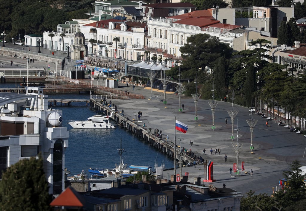 The Russian flag flies on an embankment in Yalta, a holiday resort in Crimea, in 2025. Photo: Reuters The Russian flag flies on an embankment in Yalta, a holiday resort in Crimea, in 2025. Photo: Reuters