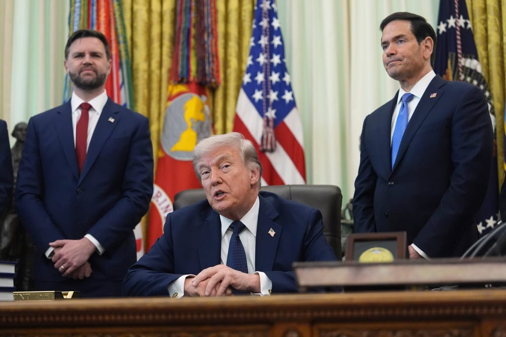 President Donald Trump speaks as Secretary of State Marco Rubio (right) and Vice-President J.D. Vance listen in the Oval Office in April. Photo: AP President Donald Trump speaks as Secretary of State Marco Rubio (right) and Vice-President J.D. Vance listen in the Oval Office in April. Photo: AP