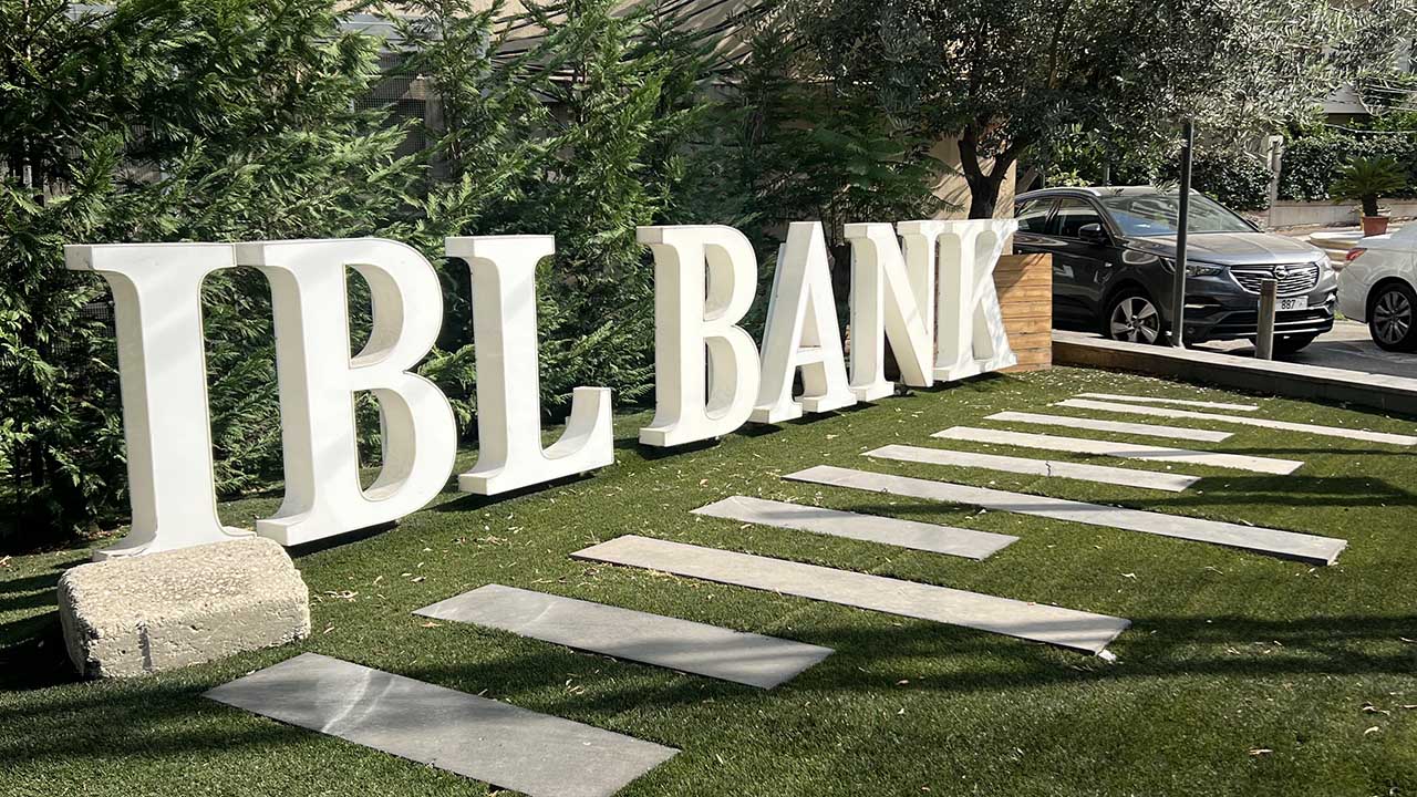 Photo of a sign that reads IBL Bank.