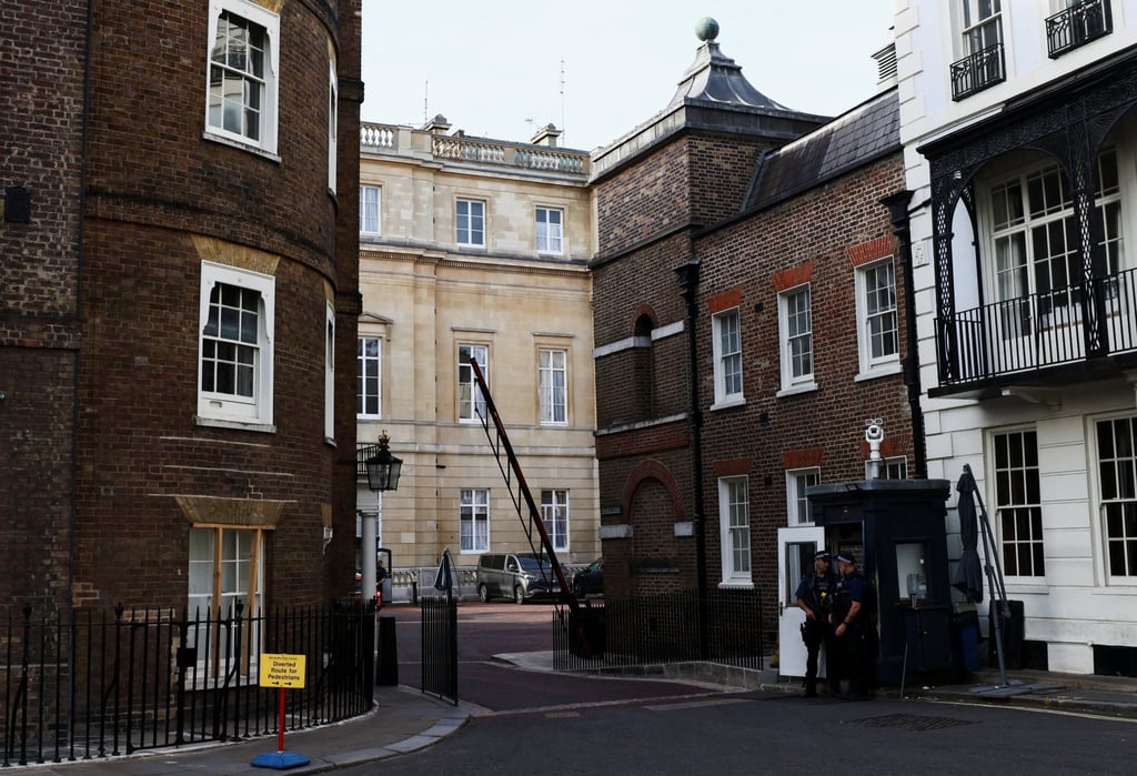 Police officers stand guard outside a rear entrance to Clarence House, an official residence of Britain’s King Charles, in London on Tuesday. Photo: Reuters Police officers stand guard outside a rear entrance to Clarence House, an official residence of Britain’s King Charles, in London on Tuesday. Photo: Reuters