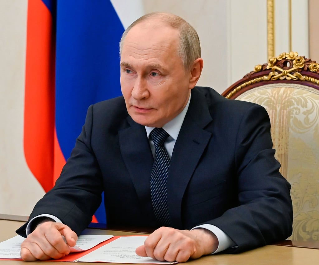 Russian President Vladimir Putin chairs a Security Council meeting via videoconference at the Kremlin on Friday. Photo: Kremlin Pool Photo/AP Russian President Vladimir Putin chairs a Security Council meeting via videoconference at the Kremlin on Friday. Photo: Kremlin Pool Photo/AP