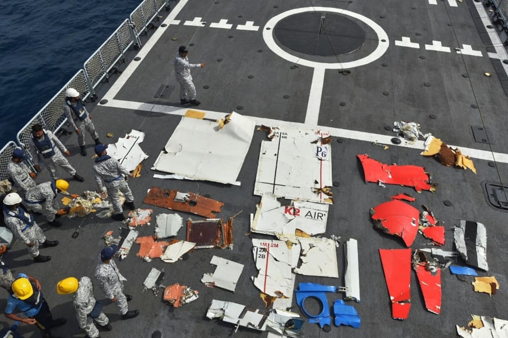 Pakistan Navy personnel examine the wreckage of a cargo plane of the private carrier K2 Airways on a naval ship after recovering them from deep sea west of Karachi on Wednesday. Photo: Pakistan Navy via AP Pakistan Navy personnel examine the wreckage of a cargo plane of the private carrier K2 Airways on a naval ship after recovering them from deep sea west of Karachi on Wednesday. Photo: Pakistan Navy via AP