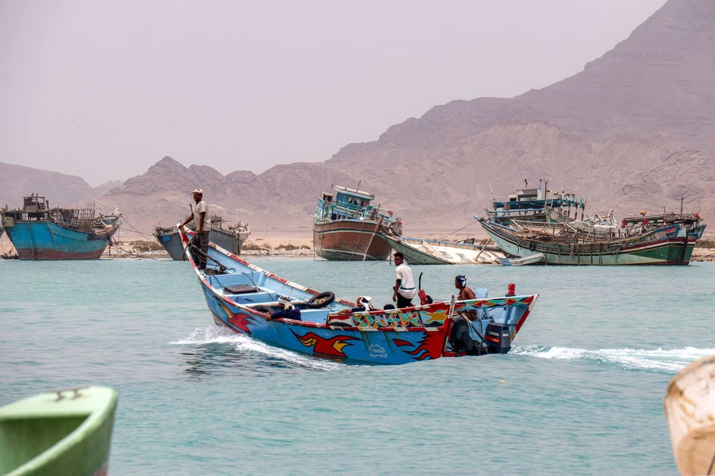 People sit in a fishing boat sailing the Bab el-Mandeb Strait off Yemen’s southern Taiz province on Saturday. Photo: AFP People sit in a fishing boat sailing the Bab el-Mandeb Strait off Yemen’s southern Taiz province on Saturday. Photo: AFP