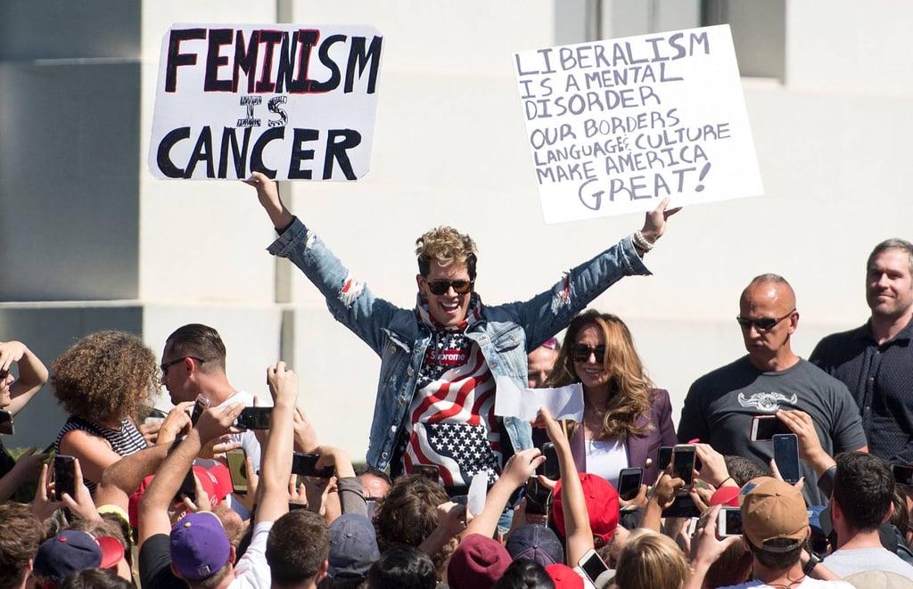 British right-wing commentator Milo Yiannopoulos holds up signs to a crowd of supporters on the University of California, Berkeley campus in September 2017. Photo: AFP British right-wing commentator Milo Yiannopoulos holds up signs to a crowd of supporters on the University of California, Berkeley campus in September 2017. Photo: AFP