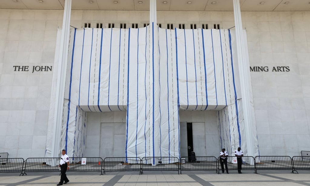 Security keeps watch at the main entrance to the Kennedy Centre in Washington on Thursday. Photo: Reuters Security keeps watch at the main entrance to the Kennedy Centre in Washington on Thursday. Photo: Reuters
