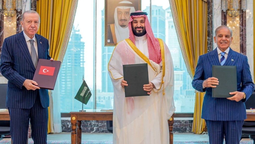 (From left) Turkish President Tayyip Erdogan, Saudi Crown Prince Mohammed bin Salman, and Pakistan’s Prime Minister Shehbaz Sharif pose after signing a joint defence agreement in Mecca on Friday. Photo: Handout/Reuters (From left) Turkish President Tayyip Erdogan, Saudi Crown Prince Mohammed bin Salman, and Pakistan’s Prime Minister Shehbaz Sharif pose after signing a joint defence agreement in Mecca on Friday. Photo: Handout/Reuters