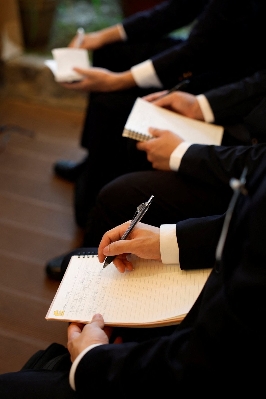 South Korean jobseekers take notes during a presentation at a fair connecting applicants with Japanese employers in Seoul on July 12. Photo: Reuters South Korean jobseekers take notes during a presentation at a fair connecting applicants with Japanese employers in Seoul on July 12. Photo: Reuters
