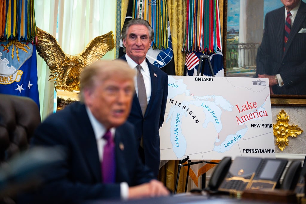 A poster shows the name change from Lake Ontario to “Lake America”, as US President Donald Trump signs an executive order in the Oval Office on Thursday. Photo: EPA A poster shows the name change from Lake Ontario to “Lake America”, as US President Donald Trump signs an executive order in the Oval Office on Thursday. Photo: EPA