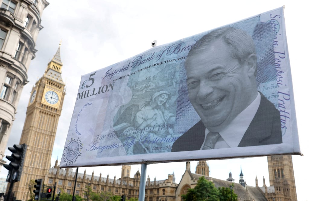 A protest placard depicting leader of Reform UK party Nigel Farage and questioning party donations is displayed near the Houses of Parliament in London on Wednesday. Photo: Reuters A protest placard depicting leader of Reform UK party Nigel Farage and questioning party donations is displayed near the Houses of Parliament in London on Wednesday. Photo: Reuters