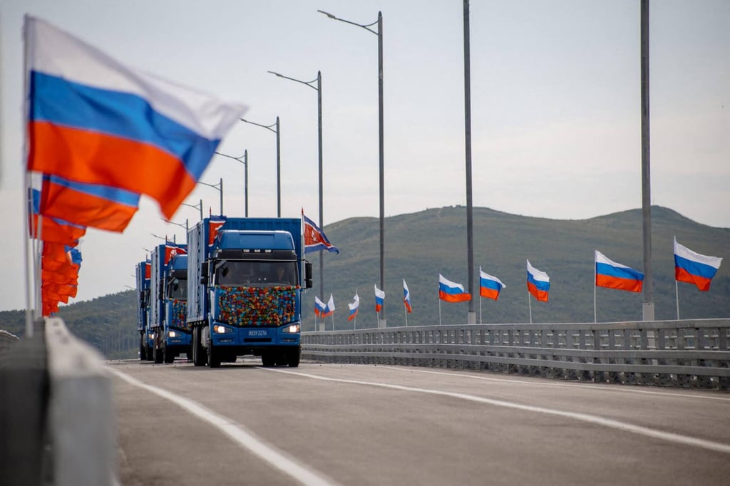 North Korean trucks cross the new Russia-North Korea road bridge over the Tumen river, during the opening ceremony on Monday. Photo: Handout / Russian Transport Ministry / AFP North Korean trucks cross the new Russia-North Korea road bridge over the Tumen river, during the opening ceremony on Monday. Photo: Handout / Russian Transport Ministry / AFP