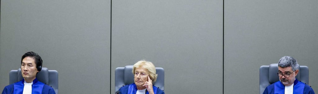 Judges Joanna Korner (centre), Keebong Paek (left) and Nicolas Guillou chair a preliminary hearing of former Philippine president Rodrigo Duterte at the International Criminal Court in The Hague on Wednesday. Photo: AFP Judges Joanna Korner (centre), Keebong Paek (left) and Nicolas Guillou chair a preliminary hearing of former Philippine president Rodrigo Duterte at the International Criminal Court in The Hague on Wednesday. Photo: AFP