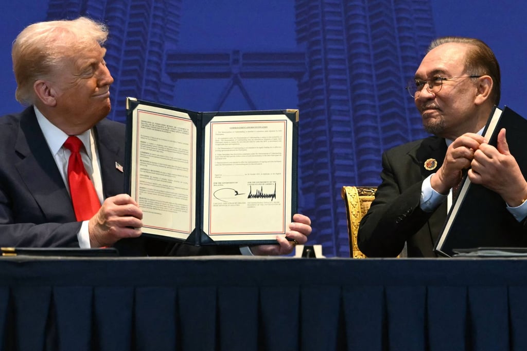 US President Donald Trump and Malaysia’s Prime Minister Anwar Ibrahim hold signed trade documents on the sidelines of last year’s Asean summit in Kuala Lumpur. Photo: AFP US President Donald Trump and Malaysia’s Prime Minister Anwar Ibrahim hold signed trade documents on the sidelines of last year’s Asean summit in Kuala Lumpur. Photo: AFP