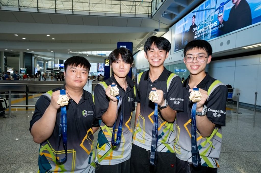From left: Tse Yu-lok (welding), Wan Tsz-ho and Huang To-kong (concrete construction), and Law Chak-sum (painting and decorating) with the three Medallions for Excellence won at WorldSkills Shanghai 2026.